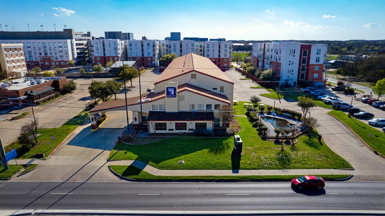 Knights Inn | Walk-to-Texas A&M | ±2.07 AC | ±49,614 SF | 110-Keys | Value‑add or Conversion Play